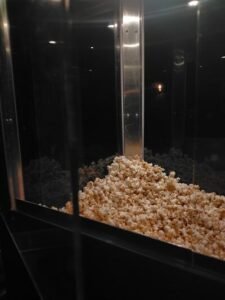 A pile of popcorn in a machine