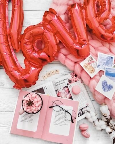Red 'love' balloons with romantic decor